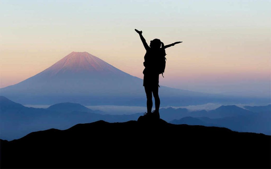 Woman on mountain – WestmountMag.ca